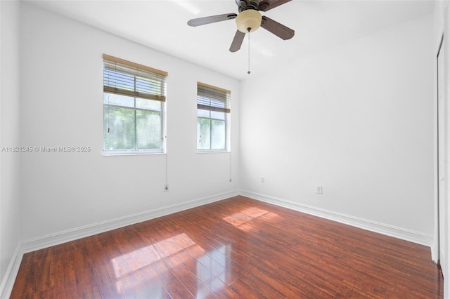 7633 NW 114th Path Unit 7633, Doral, FL 33178 - spare room with dark wood finished floors and a ceiling fan