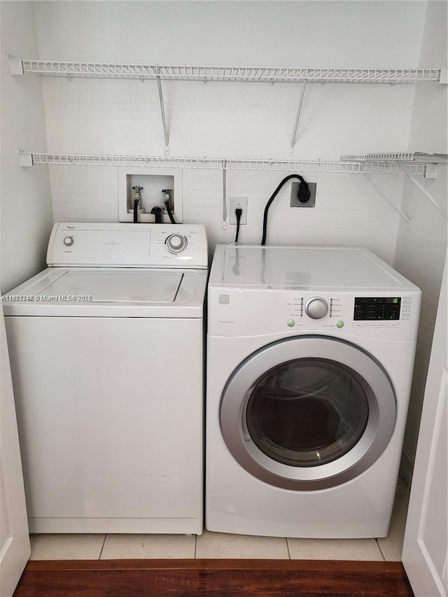 7633 NW 114th Path Unit 7633, Doral, FL 33178 - washroom with washing machine and clothes dryer