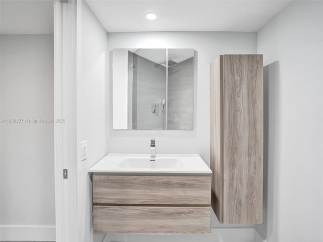 605 Oaks Dr Unit 309, Pompano Beach, FL 33069 - bathroom with vanity and recessed lighting