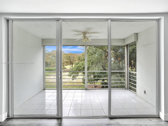 605 Oaks Dr Unit 309, Pompano Beach, FL 33069 - unfurnished sunroom with plenty of natural light
