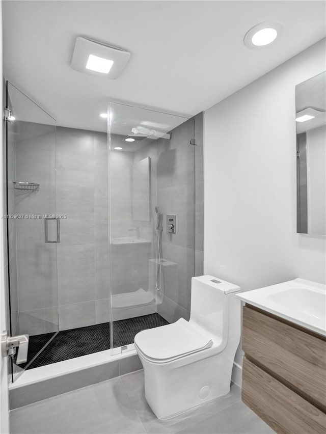 605 Oaks Dr Unit 309, Pompano Beach, FL 33069 - bathroom featuring vanity, a shower stall, and tile patterned flooring