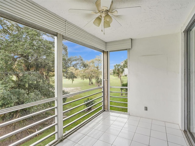 605 Oaks Dr Unit 309, Pompano Beach, FL 33069 - unfurnished sunroom with ceiling fan