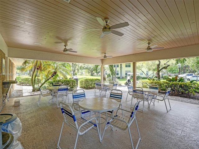 605 Oaks Dr Unit 309, Pompano Beach, FL 33069 - view of patio featuring outdoor dining space and a ceiling fan