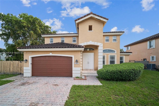 16313 SW 66th St, Miami, FL 33193 - view of front of property featuring stucco siding, decorative driveway, a garage, and a tile roof
