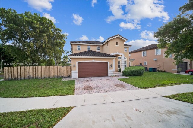 16313 SW 66th St, Miami, FL 33193 - traditional-style house featuring driveway, stucco siding, a garage, and a tile roof
