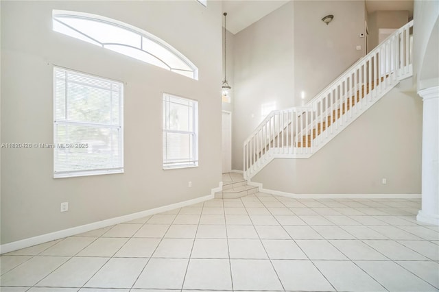 16313 SW 66th St, Miami, FL 33193 - tiled foyer with stairway and a towering ceiling