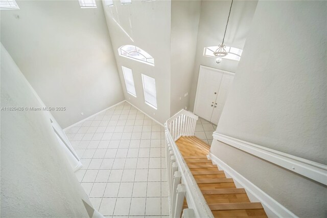 16313 SW 66th St, Miami, FL 33193 - entrance foyer featuring light tile patterned flooring and stairway
