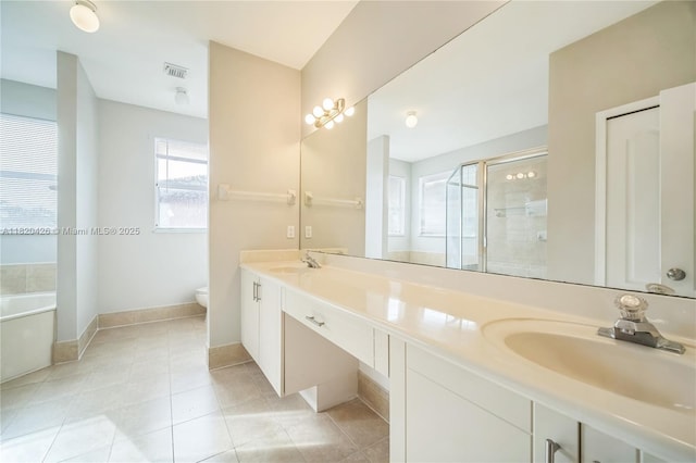 16313 SW 66th St, Miami, FL 33193 - bathroom featuring double vanity, a bath, a shower stall, and tile patterned floors