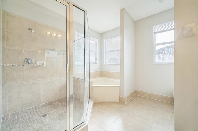 16313 SW 66th St, Miami, FL 33193 - bathroom featuring a stall shower, a bath, and tile patterned floors