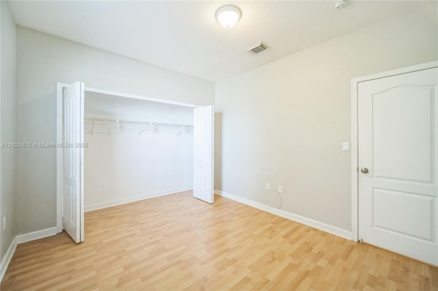 16313 SW 66th St, Miami, FL 33193 - unfurnished bedroom with light wood finished floors and a closet
