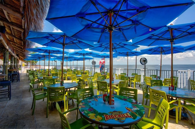 104000 Overseas Hwy Unit 5, Key Largo, FL 33037 - view of patio / terrace featuring outdoor dining area and a water view