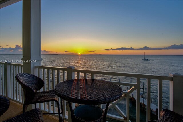 104000 Overseas Hwy Unit 5, Key Largo, FL 33037 - balcony at dusk with a water view