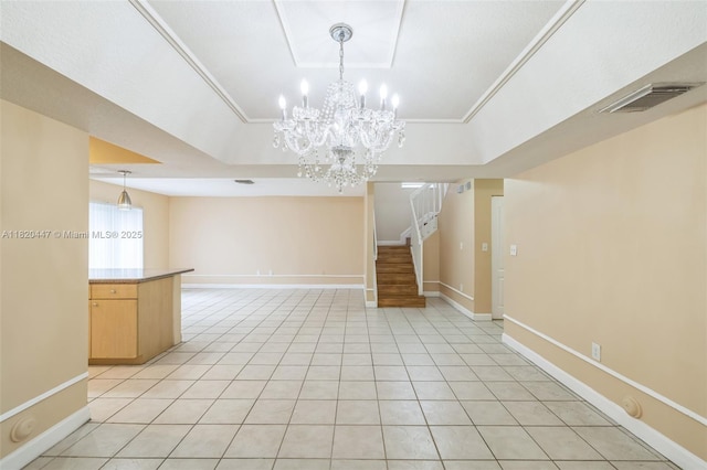 18043 SW 149th Pl, Miami, FL 33187 - spare room with light tile patterned flooring, a raised ceiling, stairs, and a chandelier