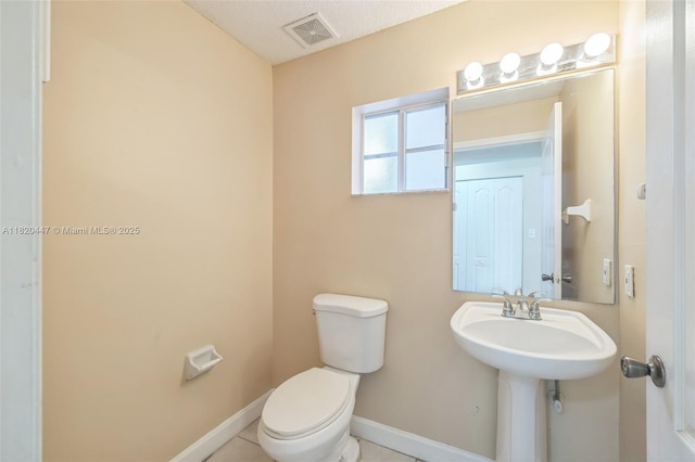 18043 SW 149th Pl, Miami, FL 33187 - bathroom featuring toilet and baseboards