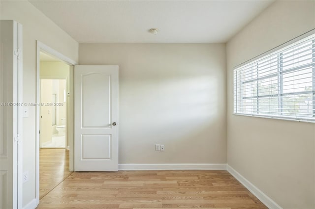 18043 SW 149th Pl, Miami, FL 33187 - unfurnished room with light wood-style flooring and a smoke detector