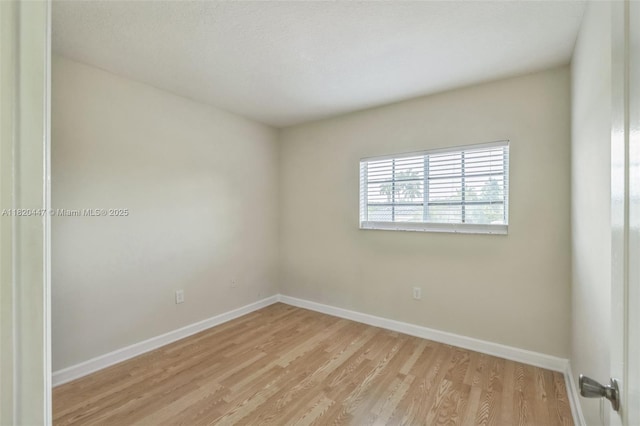 18043 SW 149th Pl, Miami, FL 33187 - unfurnished room featuring light wood-type flooring and baseboards