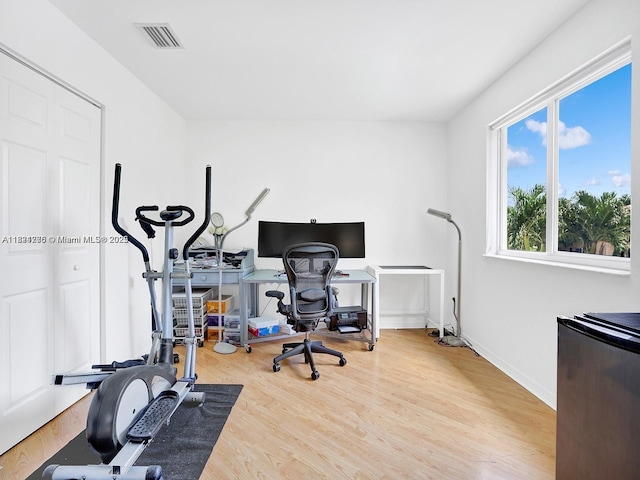 5343 NW 111th Ct, Doral, FL 33178 - home office with wood finished floors and baseboards
