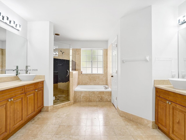 5343 NW 111th Ct, Doral, FL 33178 - full bath with a shower stall, two vanities, and a bath