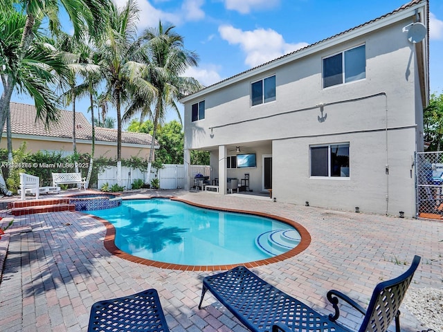 5343 NW 111th Ct, Doral, FL 33178 - view of swimming pool with a fenced backyard, a patio area, a pool with connected hot tub, and ceiling fan