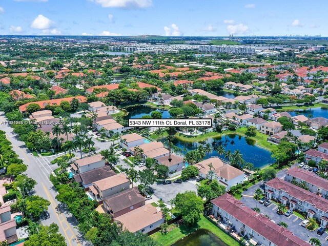 5343 NW 111th Ct, Doral, FL 33178 - aerial overview of property's location featuring a nearby body of water and nearby suburban area