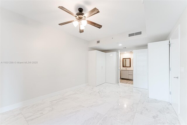 1010 Brickell Ave Unit 1409, Miami, FL 33131 - spare room with a ceiling fan, light marble finish floors, and recessed lighting