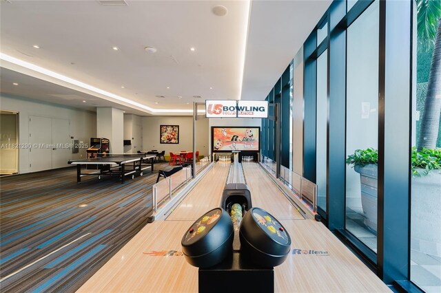1010 Brickell Ave Unit 1409, Miami, FL 33131 - rec room with bowling, carpet floors, and recessed lighting