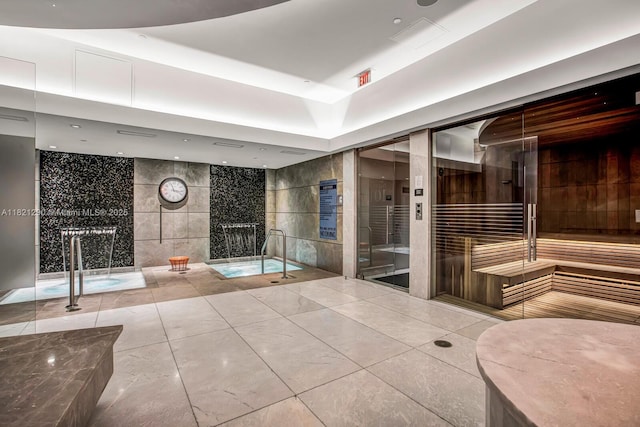 1010 Brickell Ave Unit 1409, Miami, FL 33131 - building lobby featuring tile walls