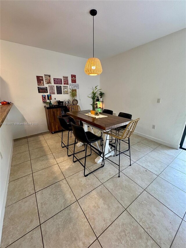 581 SE 32nd Ter, Homestead, FL 33033 - dining area with light tile patterned flooring