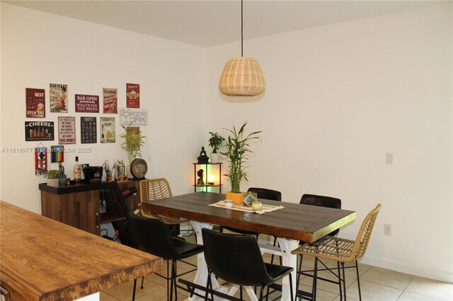 581 SE 32nd Ter, Homestead, FL 33033 - dining room featuring light tile patterned floors and baseboards