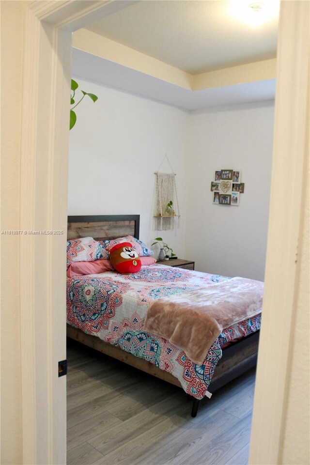 581 SE 32nd Ter, Homestead, FL 33033 - bedroom featuring wood finished floors