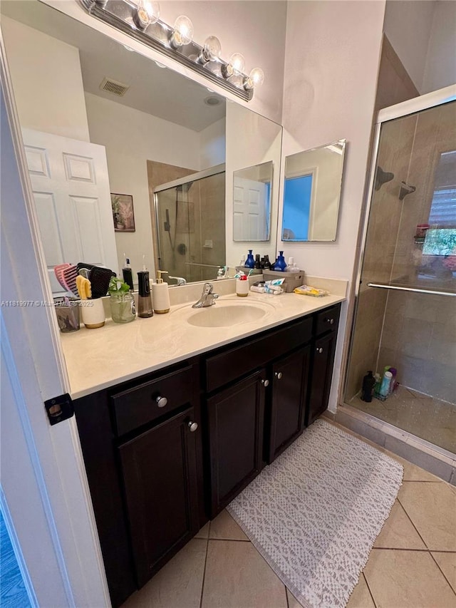 581 SE 32nd Ter, Homestead, FL 33033 - full bathroom with tile patterned flooring, a stall shower, and vanity