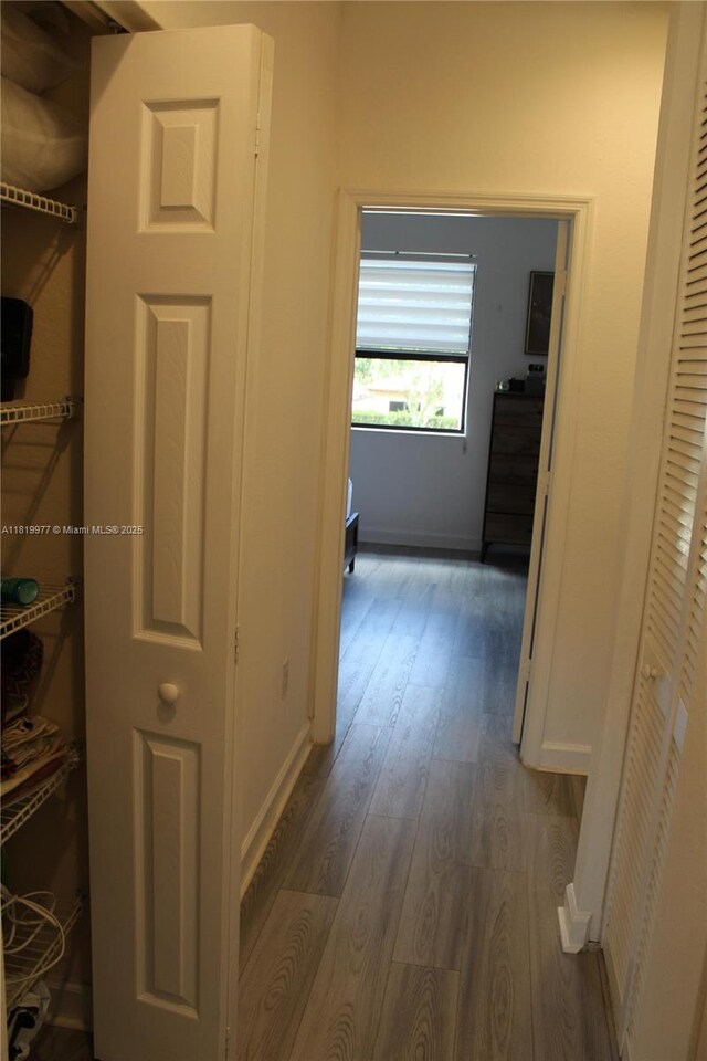 581 SE 32nd Ter, Homestead, FL 33033 - hall featuring dark wood-style flooring