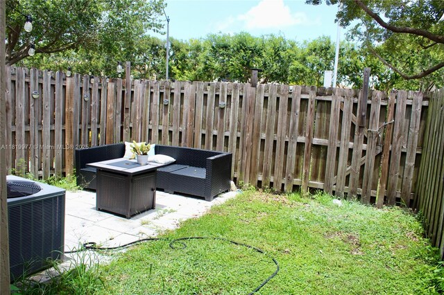 581 SE 32nd Ter, Homestead, FL 33033 - fenced backyard featuring a patio