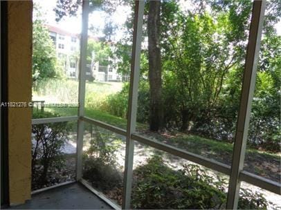 4055 W Mcnab Rd Unit H112, Pompano Beach, FL 33069 - view of unfurnished sunroom