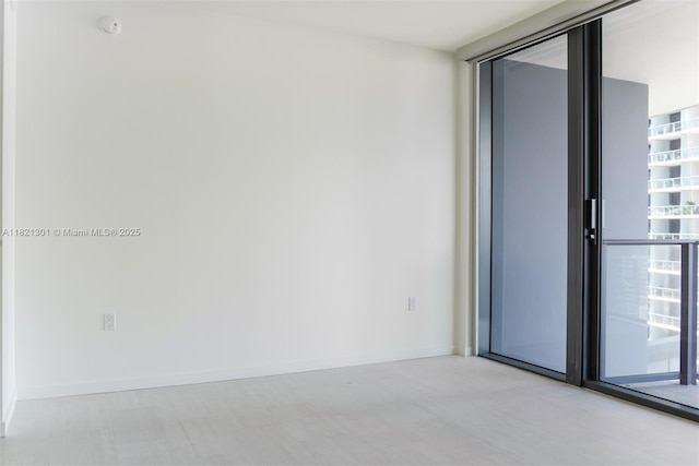 1000 Brickell Plz Unit 3703, Miami, FL 33131 - unfurnished room with tile patterned floors and baseboards
