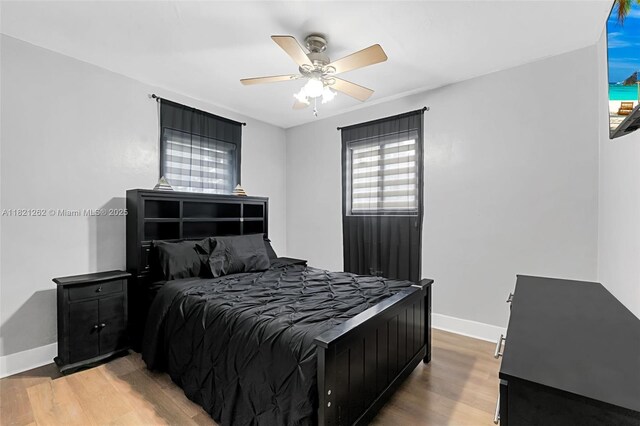 7631 Miramar Pkwy, Miramar, FL 33023 - bedroom with light wood finished floors and ceiling fan