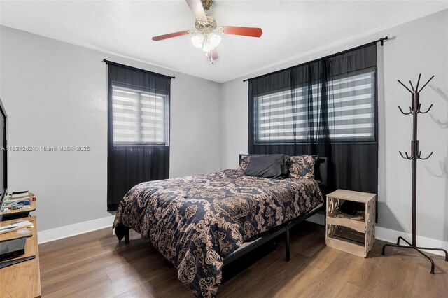 7631 Miramar Pkwy, Miramar, FL 33023 - bedroom with wood finished floors and a ceiling fan