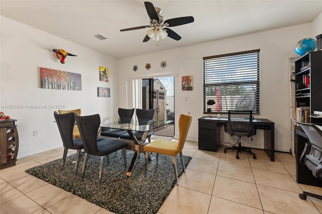 3507 W 89th Pl, Hialeah, FL 33018 - dining room featuring light tile patterned flooring, ceiling fan, and a desk