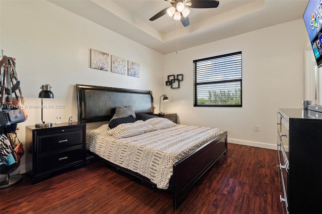 3507 W 89th Pl, Hialeah, FL 33018 - bedroom with dark wood finished floors, a tray ceiling, and a ceiling fan