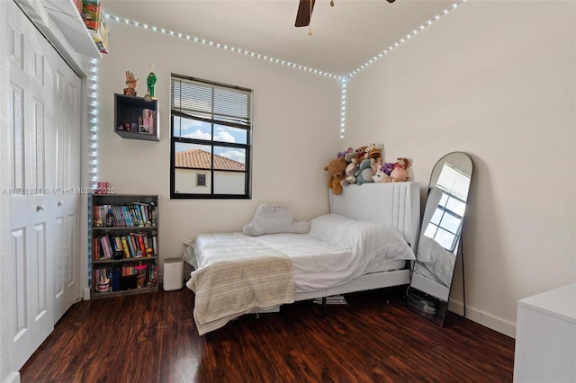 3507 W 89th Pl, Hialeah, FL 33018 - bedroom with wood finished floors, multiple windows, a closet, and a ceiling fan