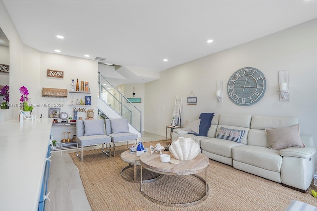 4034 N Ocean Dr, Hollywood, FL 33019 - living room with stairway, wood finished floors, and recessed lighting