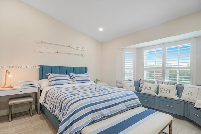 4034 N Ocean Dr, Hollywood, FL 33019 - bedroom with recessed lighting, light wood-style flooring, and vaulted ceiling