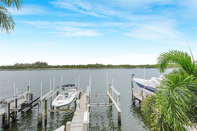 4034 N Ocean Dr, Hollywood, FL 33019 - dock featuring boat lift and a water view