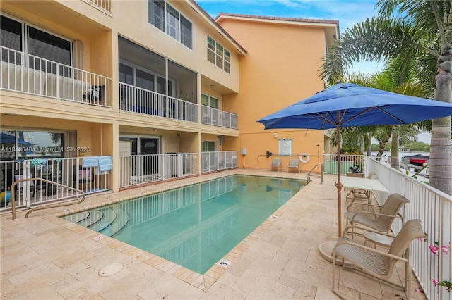 4034 N Ocean Dr, Hollywood, FL 33019 - community pool with a patio area