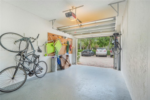 4034 N Ocean Dr, Hollywood, FL 33019 - garage with a textured wall and a garage door opener