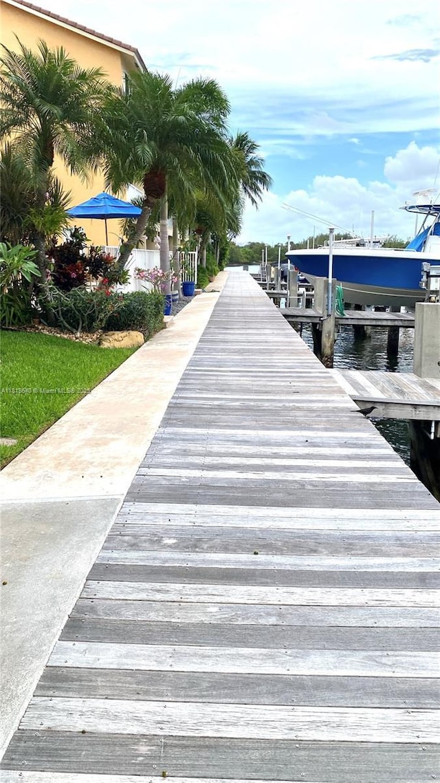 4034 N Ocean Dr, Hollywood, FL 33019 - dock area with boat lift and a water view
