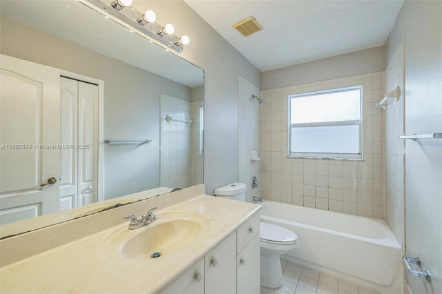 1951 NE 3rd Ct, Homestead, FL 33033 - bathroom featuring vanity, tile patterned flooring, and shower / tub combination