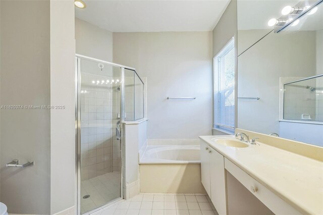 1951 NE 3rd Ct, Homestead, FL 33033 - bathroom with a garden tub, vanity, a shower stall, and tile patterned flooring