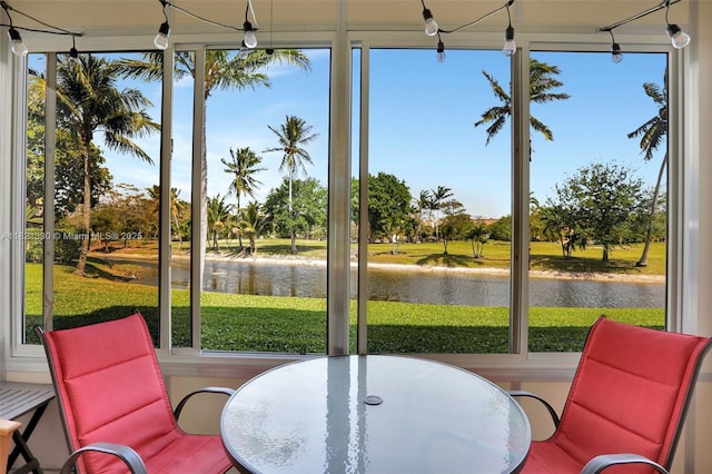 4311 NW 16th St Unit B103, Lauderhill, FL 33313 - sunroom with a water view and plenty of natural light