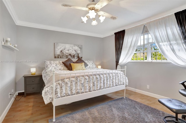 4311 NW 16th St Unit B103, Lauderhill, FL 33313 - bedroom featuring ornamental molding, wood finished floors, and a ceiling fan
